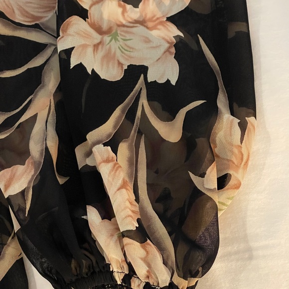 Sheer black floral blouse with tie.  Balloon sleeves.  Feminine and professional - Picture 3 of 7